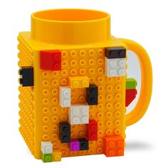 a lego coffee mug is made out of plastic blocks and has a handle for the cup