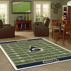 a football field rug is in the middle of a living room with chairs and tables