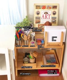 a wooden shelf filled with lots of crafting supplies on top of a hard wood floor