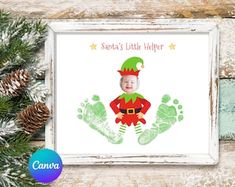 a christmas card with an image of a baby's feet and the words santa's little helper