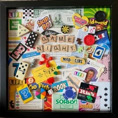 a framed game night sign with lots of different items