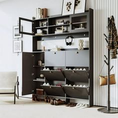 a living room with a book shelf filled with shoes