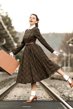 Thanks for @rou_quette wear the plaid wool dress. This plaid dress is suitable for all occasions, and the vintage plaid elements will make you love it even more. Great for fall and winter, fit and flare, and can be made to fit you as well! DETAIL * 30% wool, 30% fiber, 40% polyester * fully satiny lining, more nice to the touch body * Crew neckline * Long sleeves dress * Fit and flare dress * Back zipper closure * Two side seam pockets * Midi wool dress, Long wool dress * Plaid wool dress, Retro Wool Dress Winter, Warm Dress, Custom Dress, Dress Winter, Warm Dresses, Vintage Plaid, Dress Long Sleeve, Wool Dress, Wool Plaid