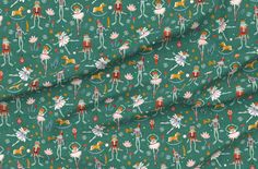 a green fabric with small cartoon figures on it