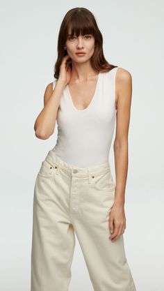 This go-to base layer is slim fit and features a deep V neckline and snap gusset closure for extra ease. Wear it as a suiting layer or on its own with denim. Womens Wool Pants, Deep V Bodysuit, Single Button Blazer, Neutral Fashion, Wardrobe Style, Black White Fashion, Silhouette Cut, High Waisted Trousers, Body Suit