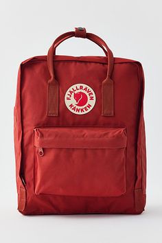 Lightweight coated canvas backpack from Fjallraven with a wraparound zip closure and an interior envelope pocket for toting your tablet. Topped with an additional zip pocket at the front and adjustable, webbed straps at the back. Double carry handles along the top. Features Fjallraven Kånken backpack Iconic Fjallraven backpack Lightweight backpack design Interior tablet pocket Adjustable straps Wraparound zipper closure Content + Care PVA, polypropylene, mixed metal Spot clean Imported Size Dime Red Backpack Aesthetic, Fjallraven Kanken Backpack Cheap, Urban Outfitters Backpack, Red Fjallraven Kanken, Fjallraven Kanken Totepack Mini, Kanken Backpack Orange, Fjallraven Kanken Orange, Backpack Fjallraven, Aesthetic Backpack