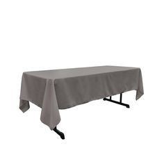 a table with a gray cloth on it