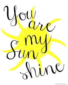 the words you are my sunshine shine in black and yellow ink on a white background