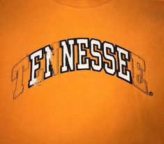 an orange shirt with the word tennessee printed on it