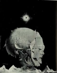 a black and white photo of a skull with a star in the sky above it