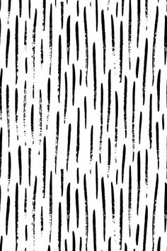 an abstract black and white background with small strokes on it's surface, which are drawn