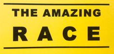 a yellow sign with the words the amazing race on it's back side and black lettering that reads, the amazing race