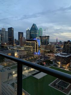 the city skyline is lit up at night