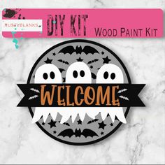 a sign that says welcome with three ghost faces on it and the words diy kit