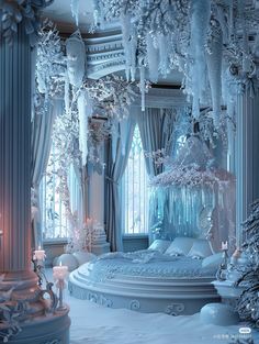 a bedroom decorated in blue and white with chandeliers hanging from the ceiling, surrounded by snow - covered trees