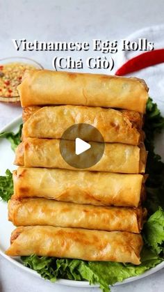 vietnamese egg rolls on a plate with lettuce