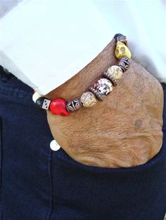 Men's Bracelet with Colorful Skulls Carved Howlite, Carved Stone,and Wood, Black… Red Beaded Bracelet For Men, Mens Red Beaded Bracelets, Men’s Stretch Bracelet, Mens Lava Bead Bracelet, Men Stone Bracelet, Men's Accessories, Colorful Skulls, Fire Agate, Skull Carving