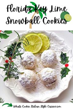 florida key lime snowball cookies on a white plate with holly and lemon wedges