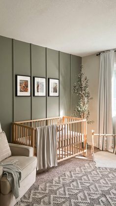 a baby crib in a living room next to a window