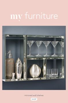 a shelf with wine glasses, vases and bottles on it that says my furniture mirrored wall shelves