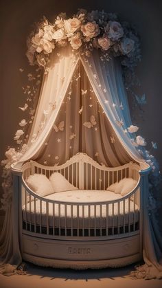 a white crib with curtains and flowers on it