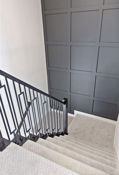 a set of stairs leading up to a garage door