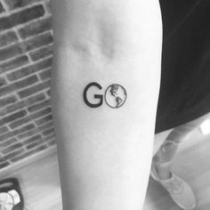 black and white photo of a person's arm with the word go on it