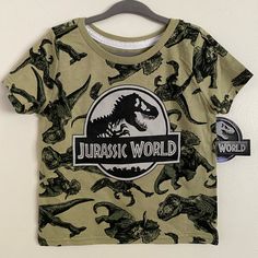 Green Dinosaur Jurassic World Shirt Printed Logo Cotton Material Dinosaur Jurassic World, Jurassic World Shirt, Jurassic Park Shirt, Dinosaur Tshirt, Universal Shirts, Dinosaur Outfit, Green Dinosaur, Jurassic World, Jurassic Park