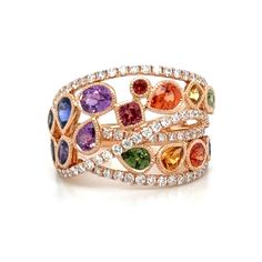 This exquisite multiple-shape rainbow sapphire rose gold ring shimmers with vibrant hues of sapphire. Its delicate rose gold band is crafted to perfection, making it a stunning piece of statement jewelry. Radiate your passions with this captivating and unique ring! Metal: 18K Rose GoldRound Cut 82 Diamonds: 0.79ct tw16 Multiple-Cut Rainbow Sapphires: 2.53ct tw - Width: 16mmSetting: Prong, Pave Sizable, desired ring size please leave us a note at the check out. Sapphire Rose Gold Ring, Rainbow Sapphires, Rainbow Jewelry, Rose Gold Band, Sapphire Diamond Ring, Unique Ring, Ring Metal, Dream Jewelry, White Rose Gold