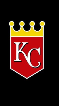 the kansas city soccer club logo on a black background with yellow and red crown around it