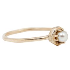 According to a Persian legend, it is believed that pearls were created when a rainbow came down from the sky and touched the earth. Whatever you believe about pearls, we think that you'll love this dainty little ring. Stone: Akoya pearlMetal: 14k yellow goldMeasurements: pearl measures 4mm in width Sizes 6.75, 7 in stock Shipping and Delivery: IN STOCK items will ship within 2 business days Sizes not In Stock will be MADE TO ORDER Please allow 4-5 weeks for delivery All MADE TO ORDER items are f Everyday Pearl Ring With Charm, Heirloom Pearl Ring As A Gift, Heirloom Pearl Ring Gift, Heirloom Style Pearl Ring Gift, Akoya Pearl Ring, Wolf Jewelry, Spike Earrings, Akoya Pearls, Pearl Studs