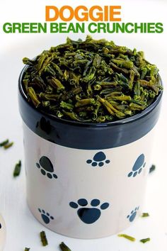 green bean crunches in a black and white container with paw prints on it