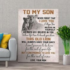 a wall mounted canvas with the words to my son on it and two lions sitting next to each other