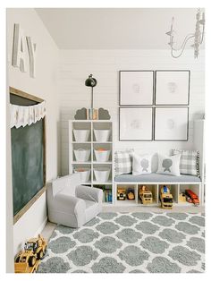 a child's playroom with toys, bookshelves and pictures on the wall