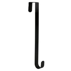 a black metal hook on a white wall