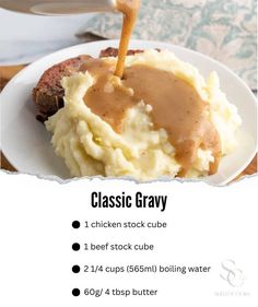 a plate with mashed potatoes and gravy on it