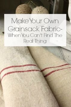 towels and balls of yarn on the floor with text overlay reading make your own grainsack fabric when you can't find the real thing