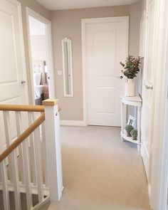 the hallway is clean and ready to be used as a home decor piece in this house