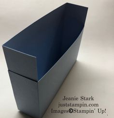 an empty blue box sitting on top of a white tablecloth covered floor with the words jeanie stark just stamp com images @ stamp up