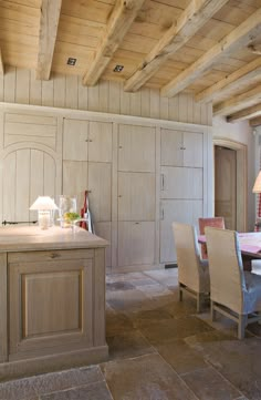 the kitchen is clean and ready to be used as a dining room or office area