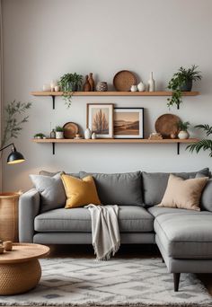 Grey Couch Living Room Grey Couch Wood Floor Living Room, Grey Couch Wood Floors, How To Style Grey Couch, Warm Up Grey Living Room, Cozy Grey Couch Living Room, White And Grey Living Room Ideas, Grey Couch Decor Ideas, Gray Leather Couch Living Room Ideas, Living Room Designs Gray Couch