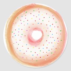 a donut with sprinkles painted on it's side in pastel pink and orange