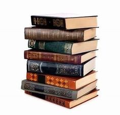 a stack of books sitting on top of each other in front of a white background