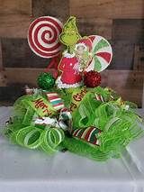 a table topped with lots of candy and lollipops on top of it