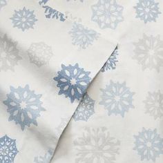 the blue and white snowflakes on this sheet are very soft, yet it's hard to tell