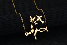 DIDa Heartbeat Necklace Stud Earrings Set StainlessSteel Jewelry Set for Women Gold >>> Find out more reviews of the product by checking out the link on the photo. (This is an affiliate link). Heartbeat Necklace, Stud Earrings Set, Jewelry Set, Cross Necklace, Arrow Necklace, Stud Earrings