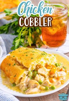 chicken cobbler on a white plate with a glass of tea in the back ground