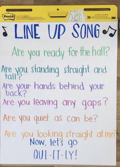 a sign that says line up song are you ready for the hall? if you standing straight and tall? are you hands behind your back? are you leaving any gaps?