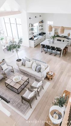 an aerial view of a living room and kitchen