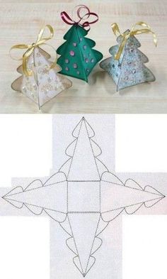 three paper christmas trees with bows on them